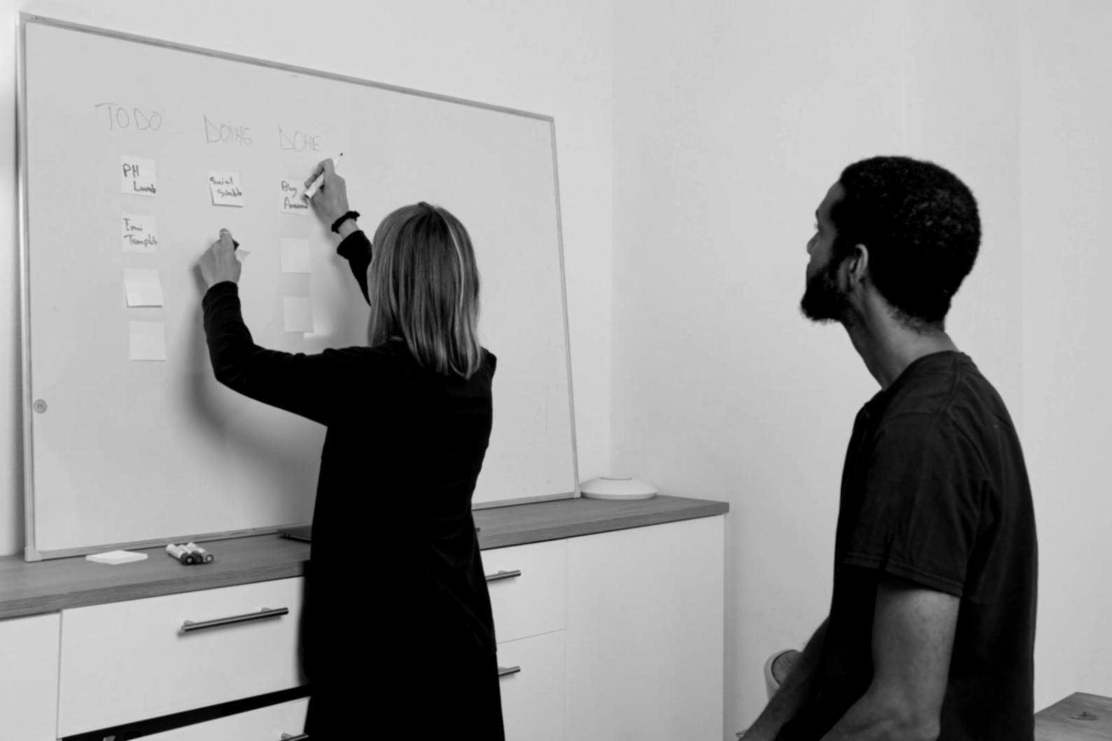 Participants engaged in emergency fund planning workshop at maravithon community center
